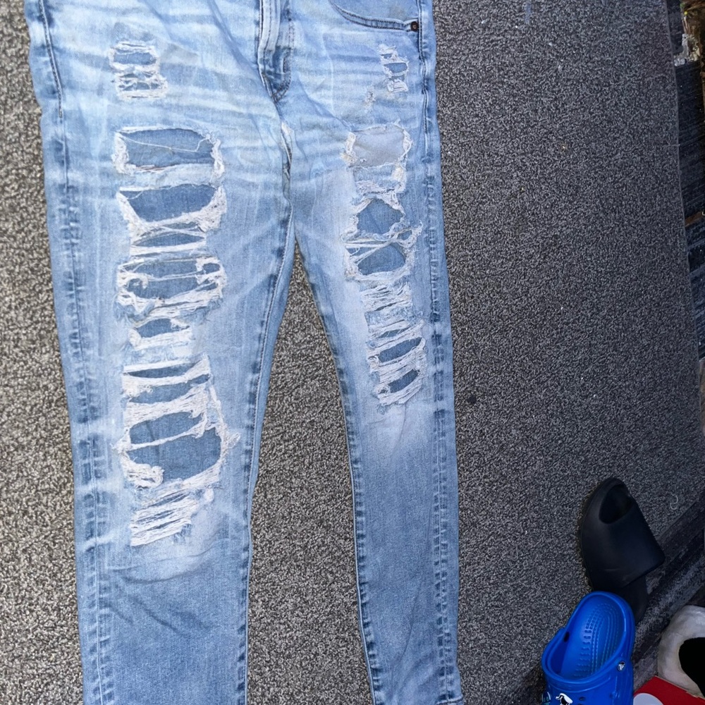 Distressed Light Blue Jeans